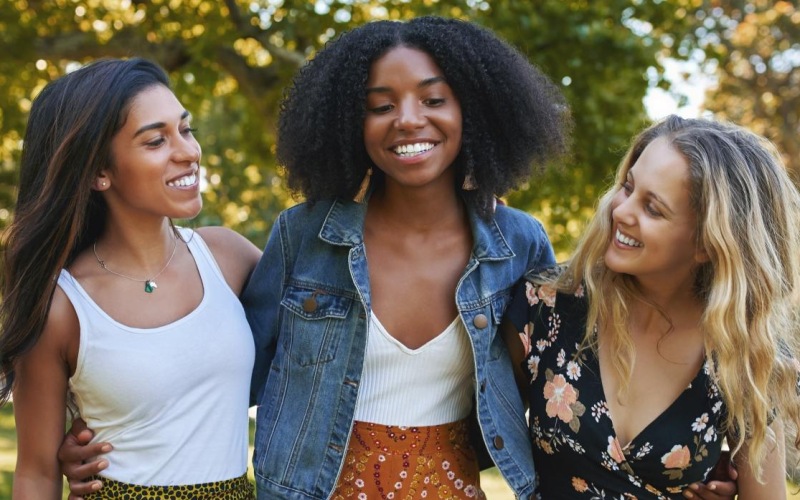 a group of women smiling